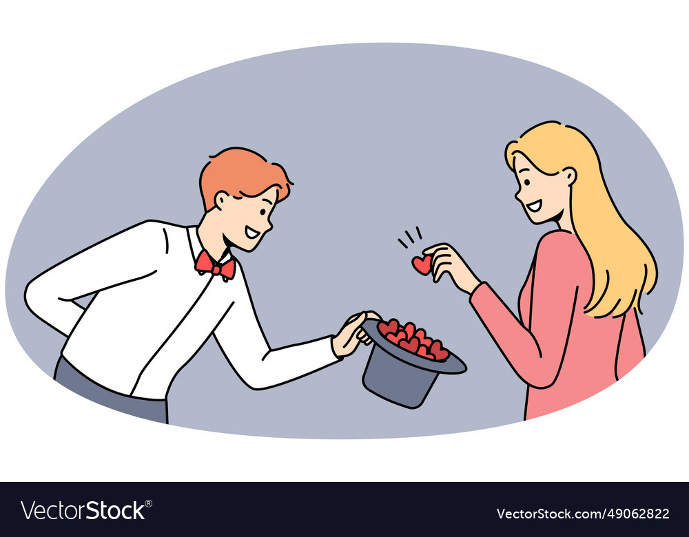 Woman take hearts from magician hat