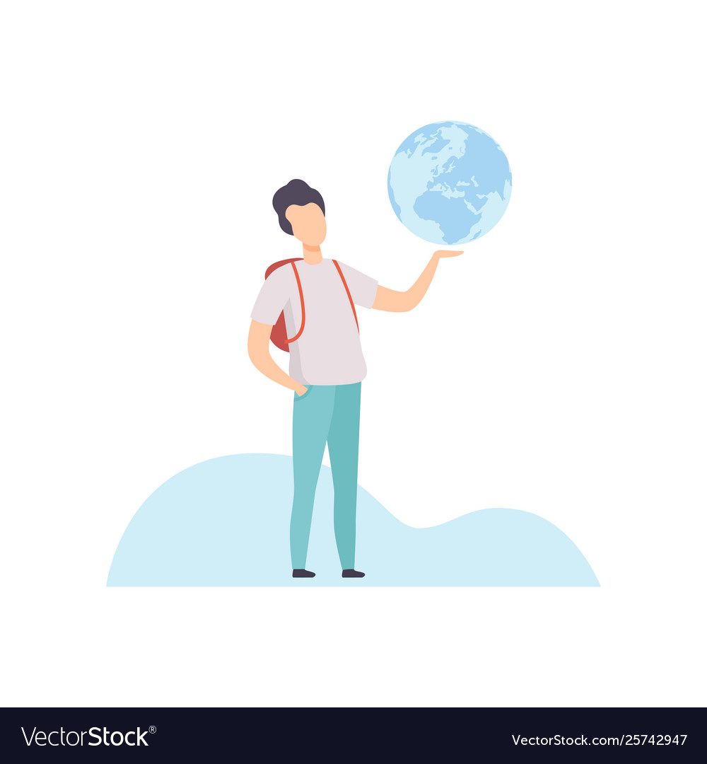 Young man with backpack holding earth globe