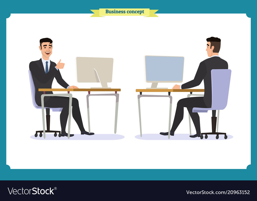 Male office worker poses sitting at computer