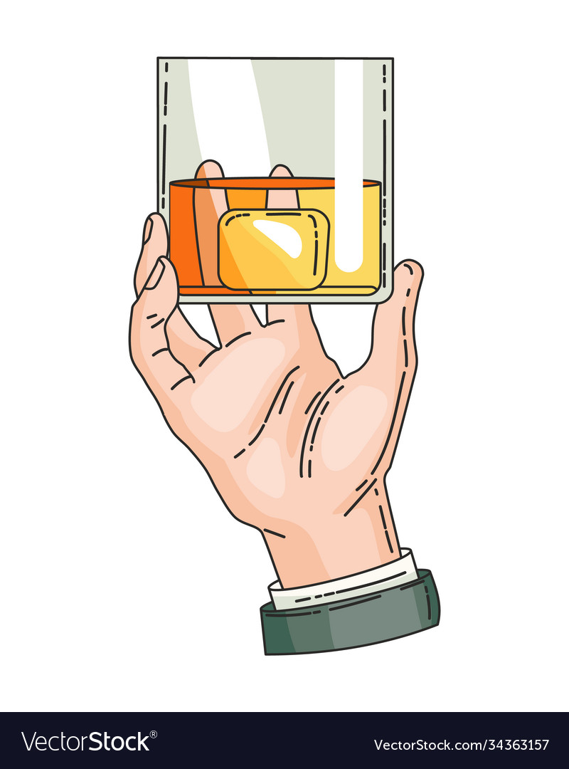 Hand holding glass with strong drink whiskey