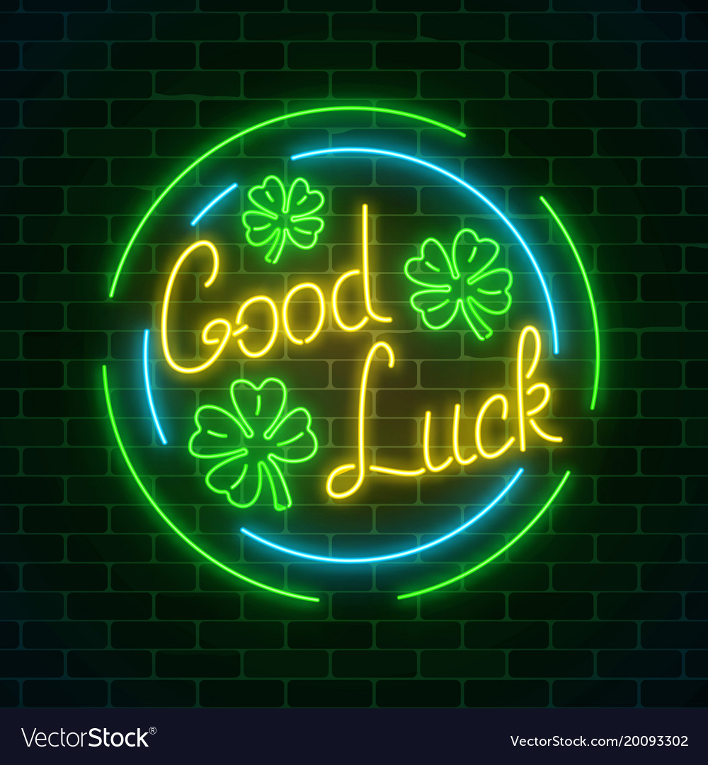 Glowing neon sign with geed luck wish