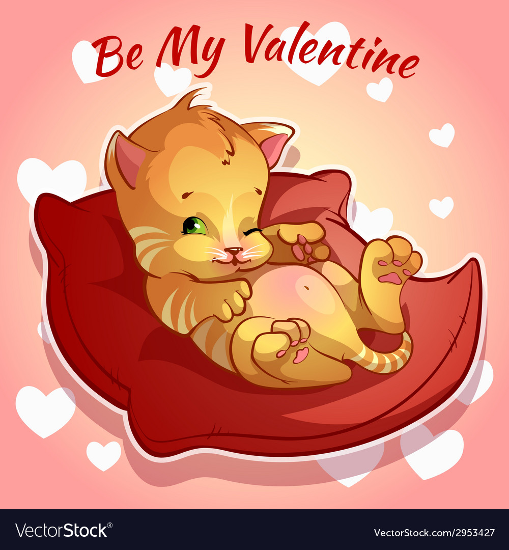 Cute ginger kitten on a red cushion