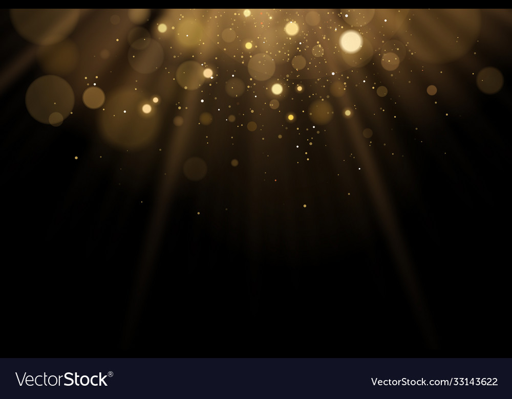 Golden flash light with glares bokeh on a black