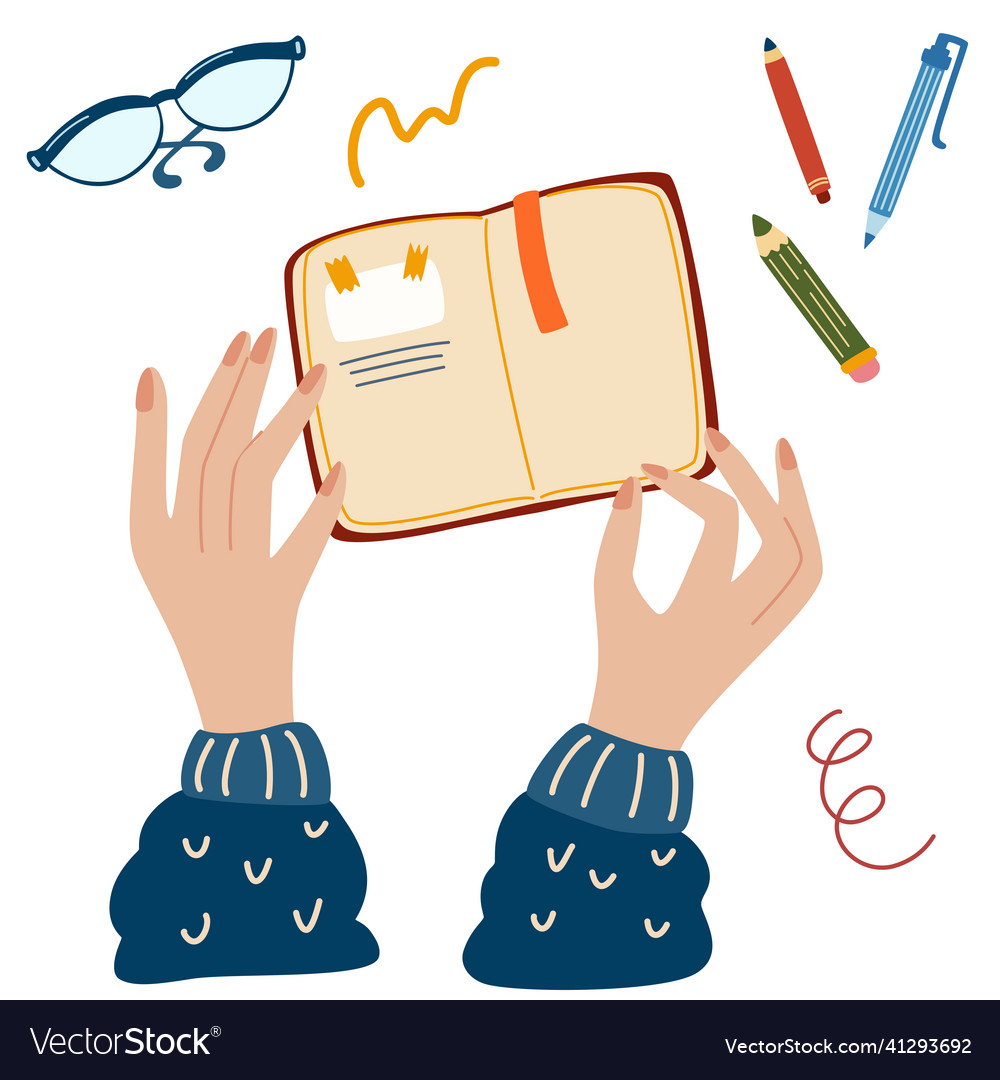 Female human hands holding book or a notebook