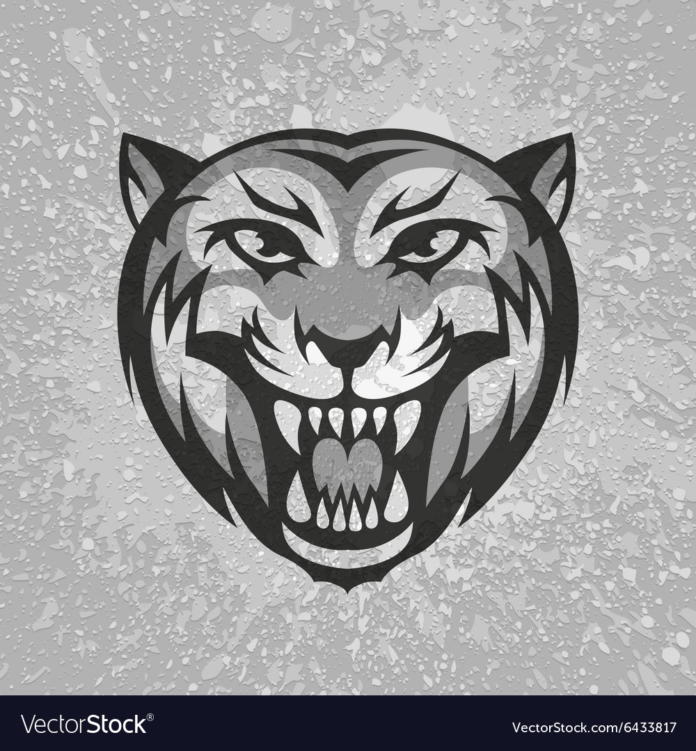 Black and grey tiger head logo on dirty plaster