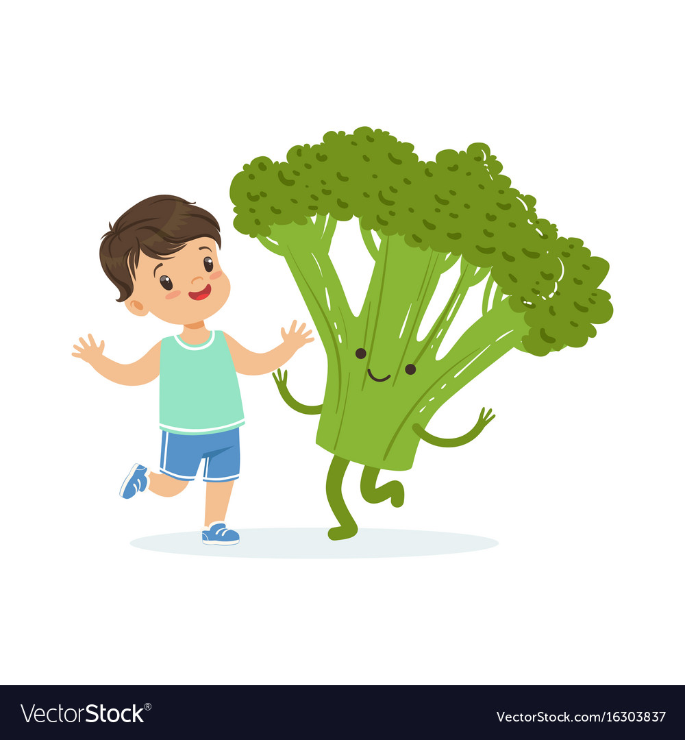 Happy boy having fun with fresh smiling broccoli