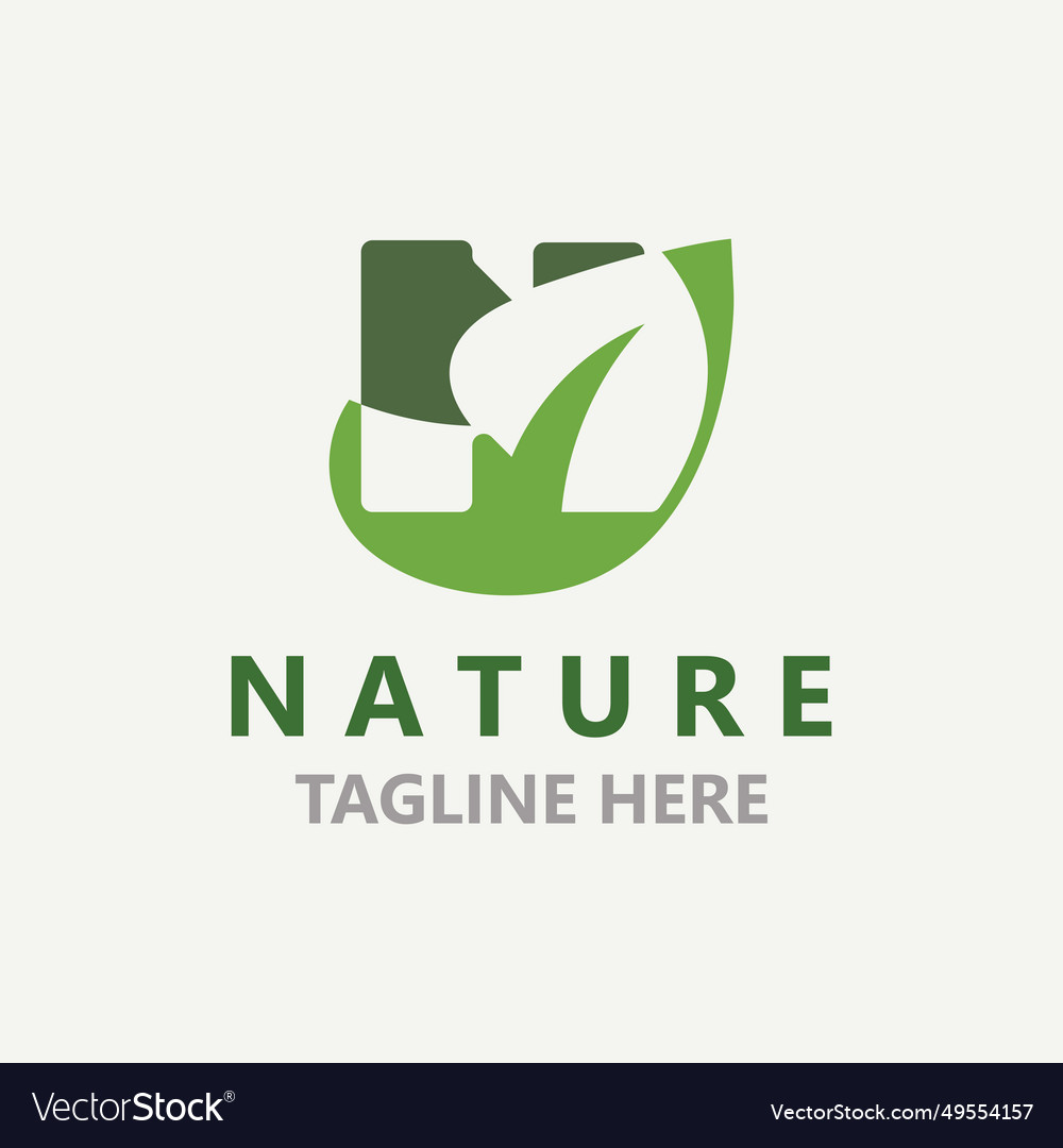 Letter n with green leaf nature logo design