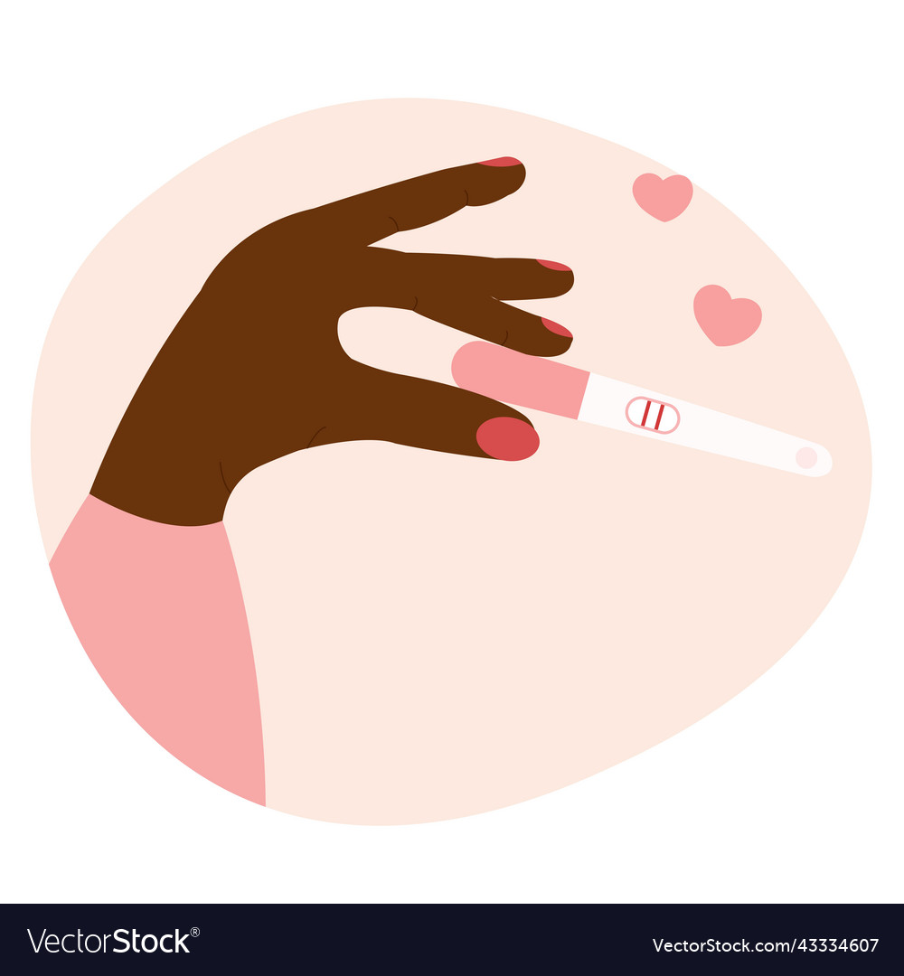 Black womans hand holding positive pregnancy test