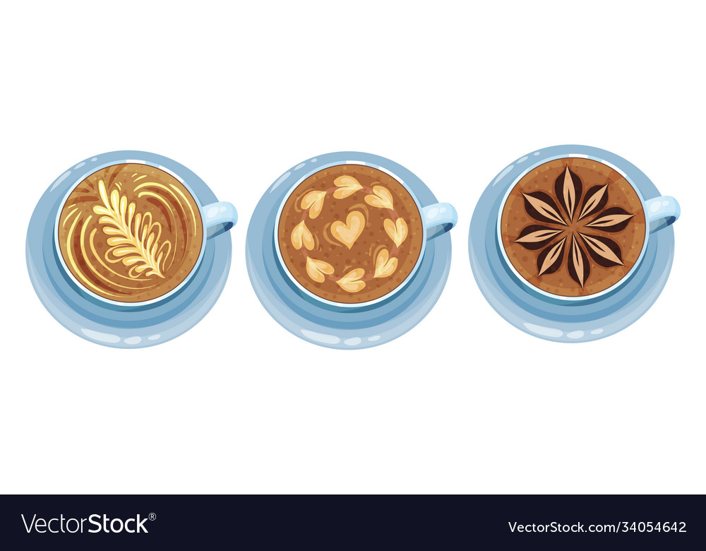 Cups on saucer with coffee latte crema art