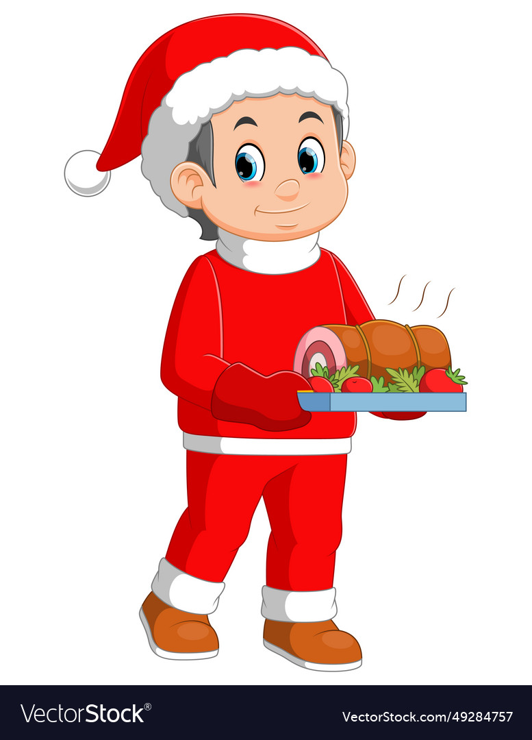 Young boy wearing santa costume showing roast