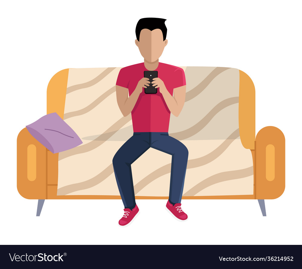 Young man is sitting on couch handsome guy