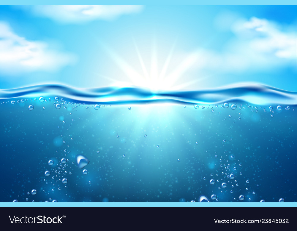 Underwater blue background in ocean with sunbeams Stock Photo