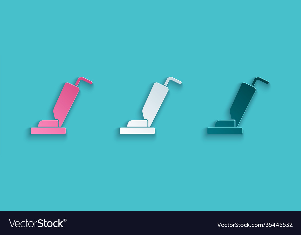 Paper cut vacuum cleaner icon isolated on blue