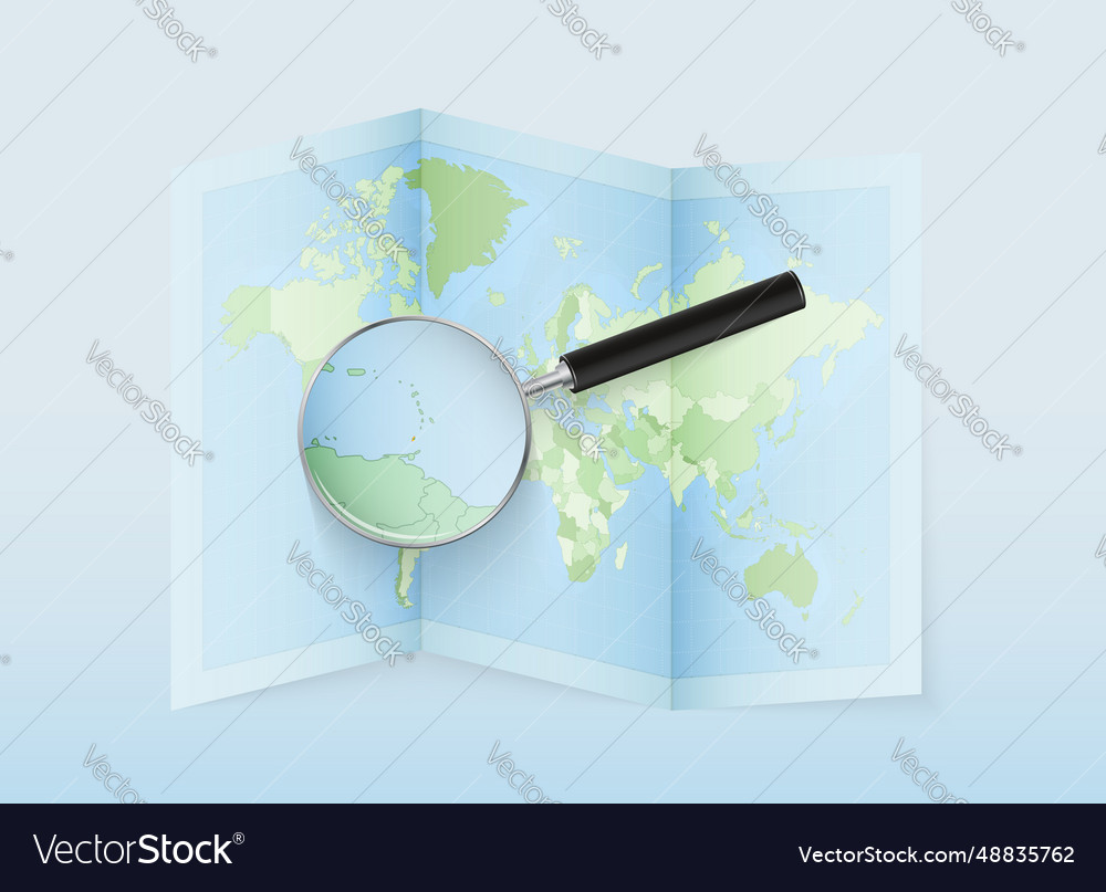 A folded world map with magnifying lens