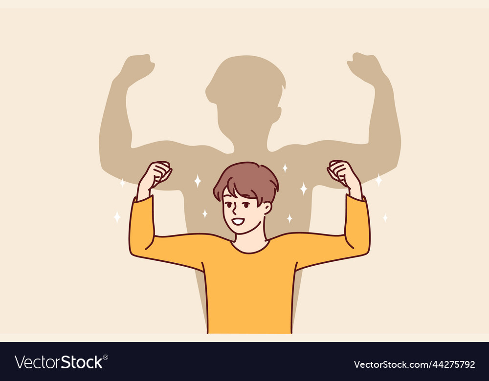 Smiling boy dream on having muscles