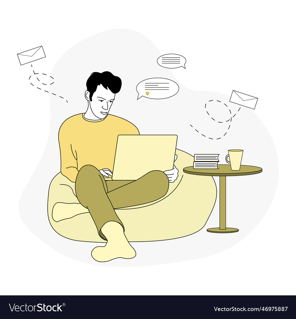 Man working on a computer while sitting in chair