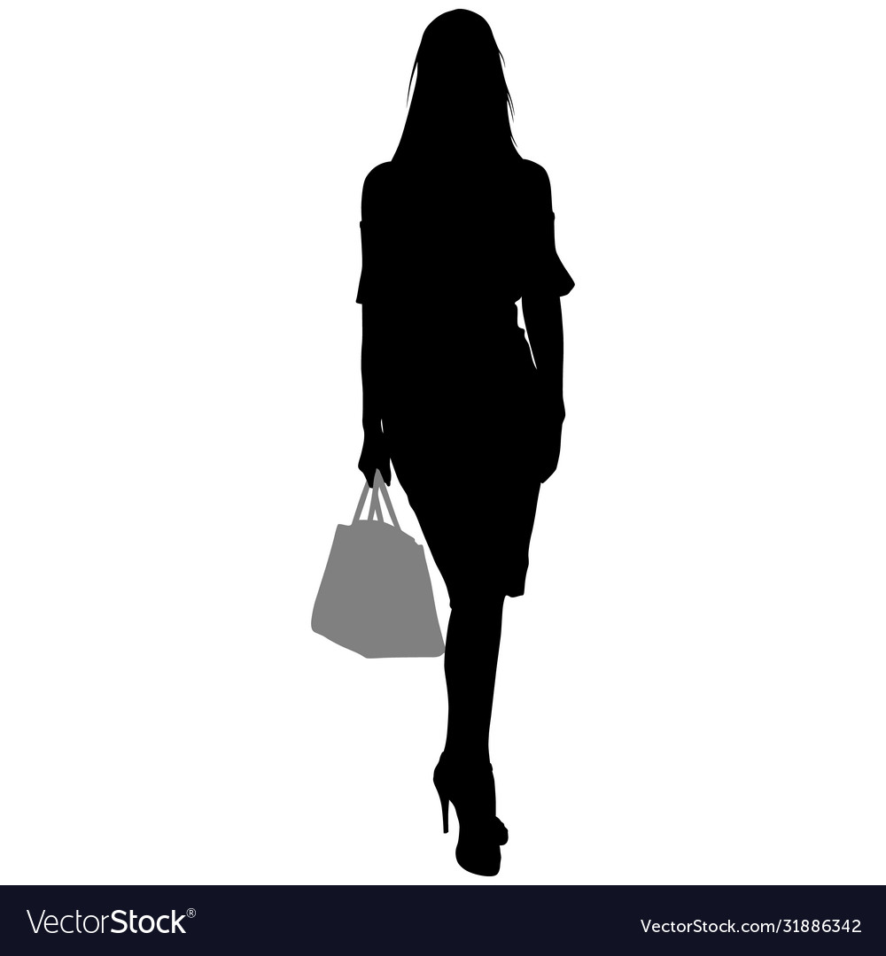 Woman is standing with a bag and skirt