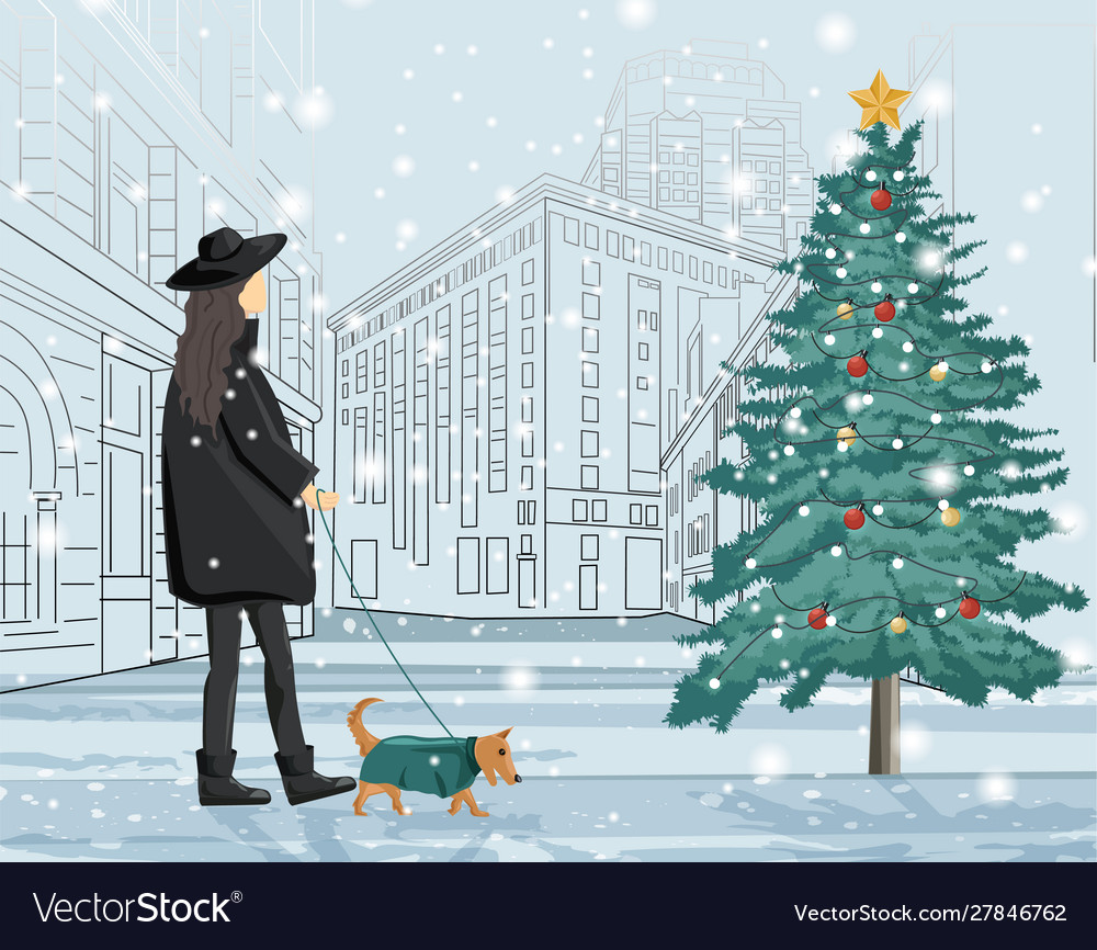 Woman in black clothes walking dog