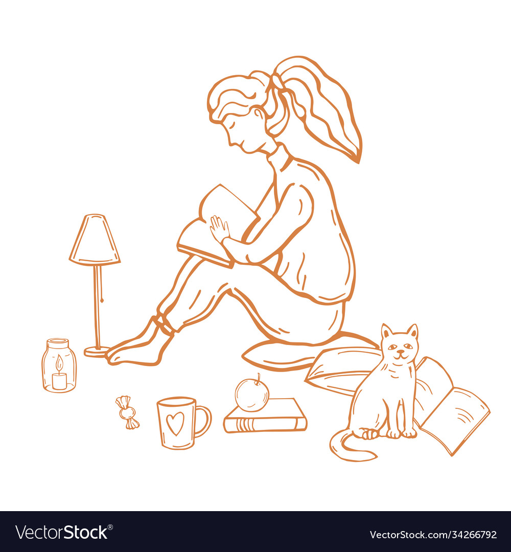 Girl with a cat sits on pillows