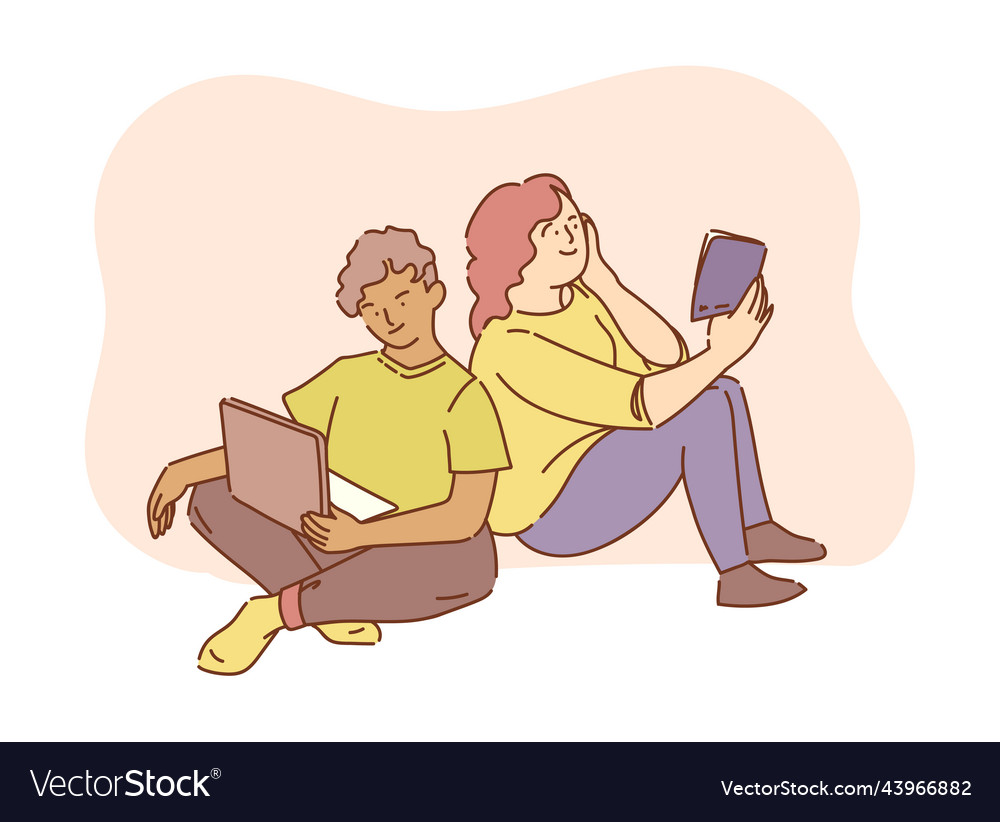 Students working with laptop computer and reading