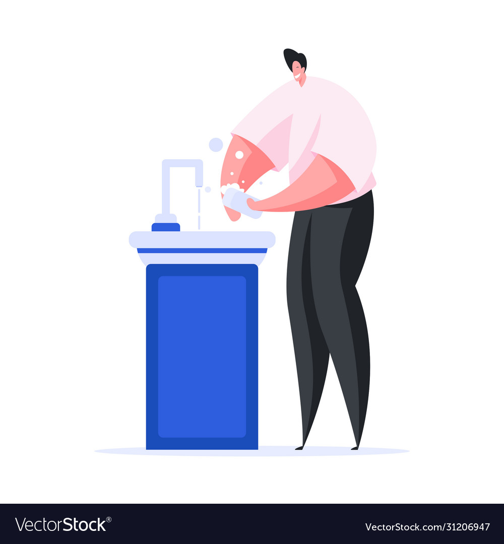 Happy man washing hands with soap over sink