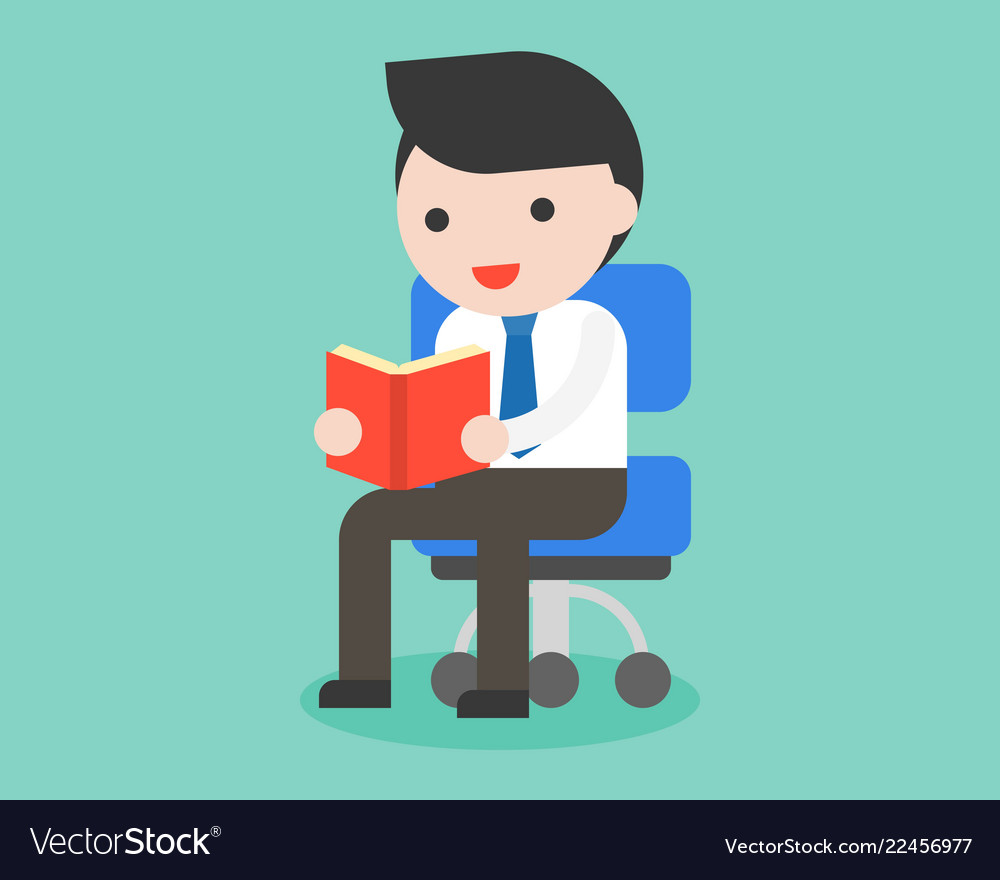 Businessman sitting on chair and reading book