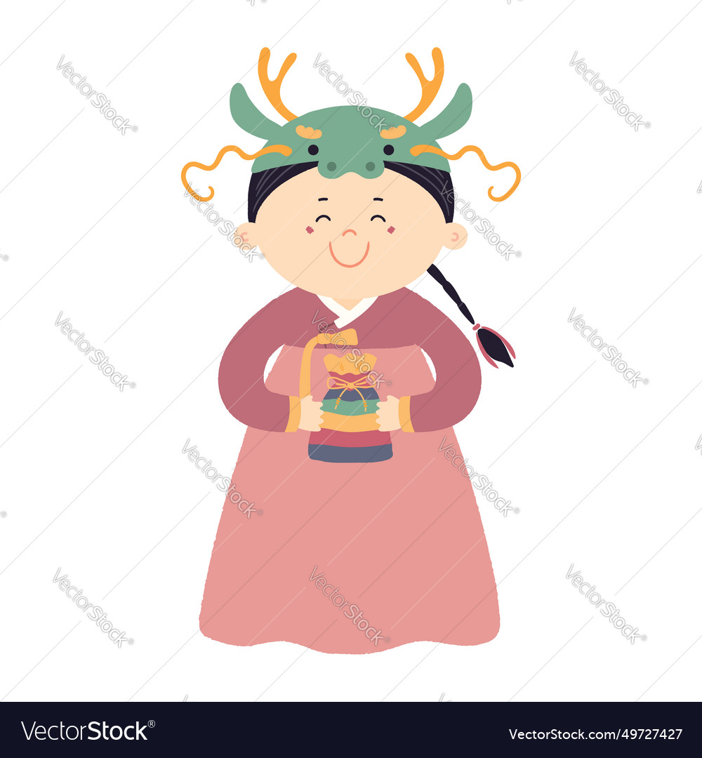 Cute girl in dragon hat holding traditional