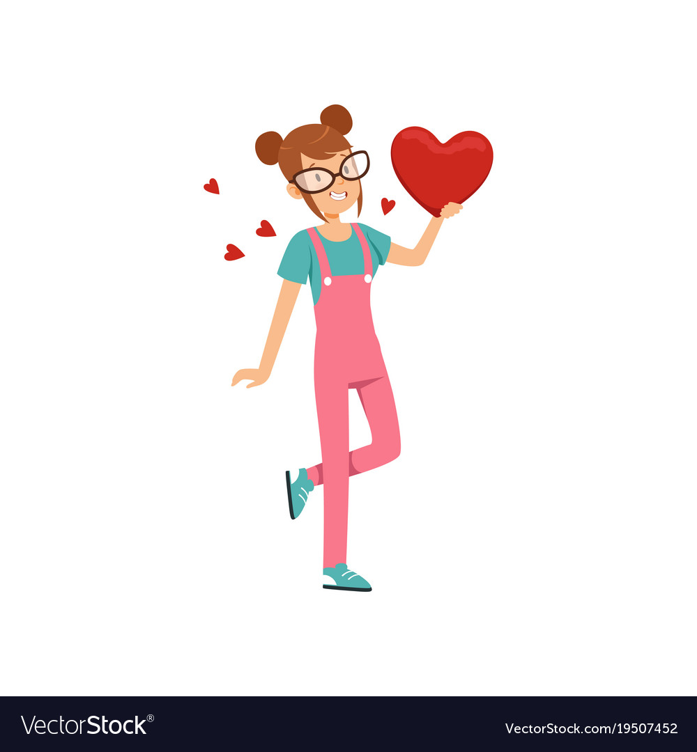 Teen girl in glasses holding red heart happy