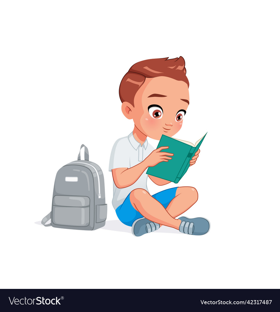 Cute little school boy reading book sitting