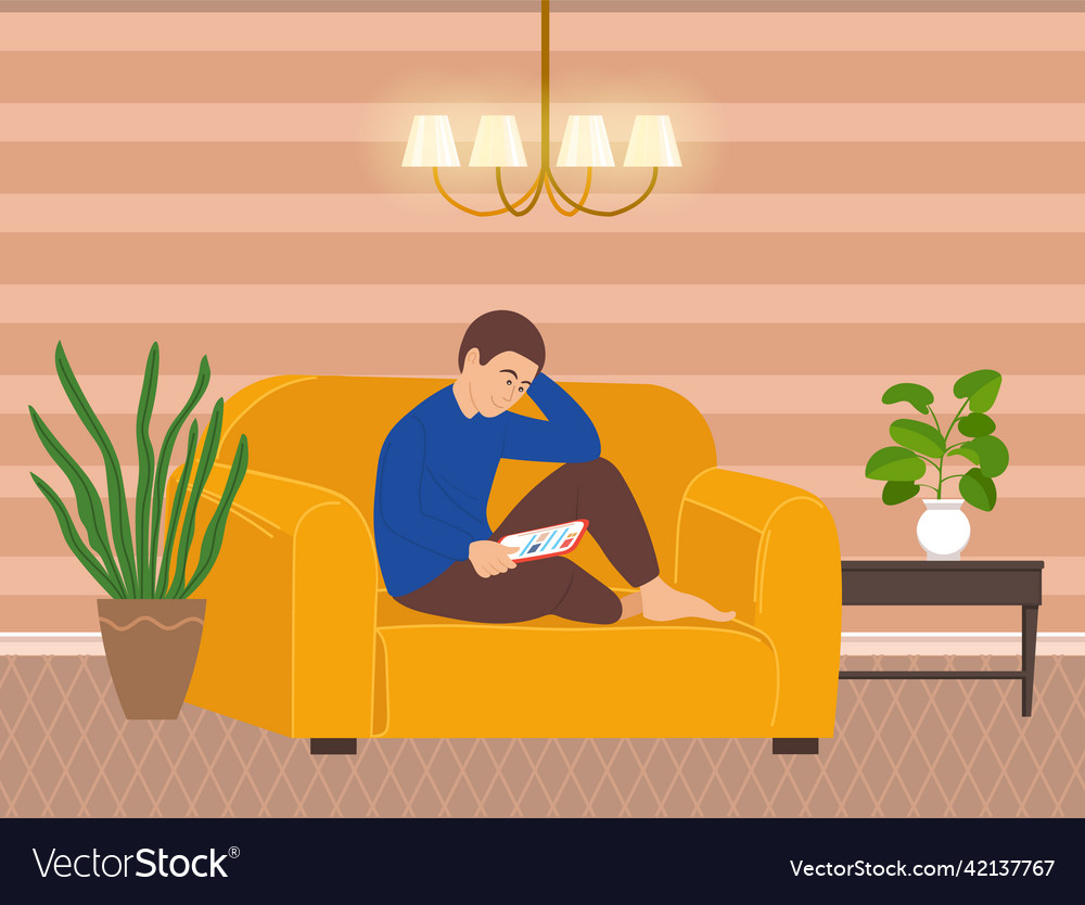 Relaxing man sits on armchair or sofa with digital