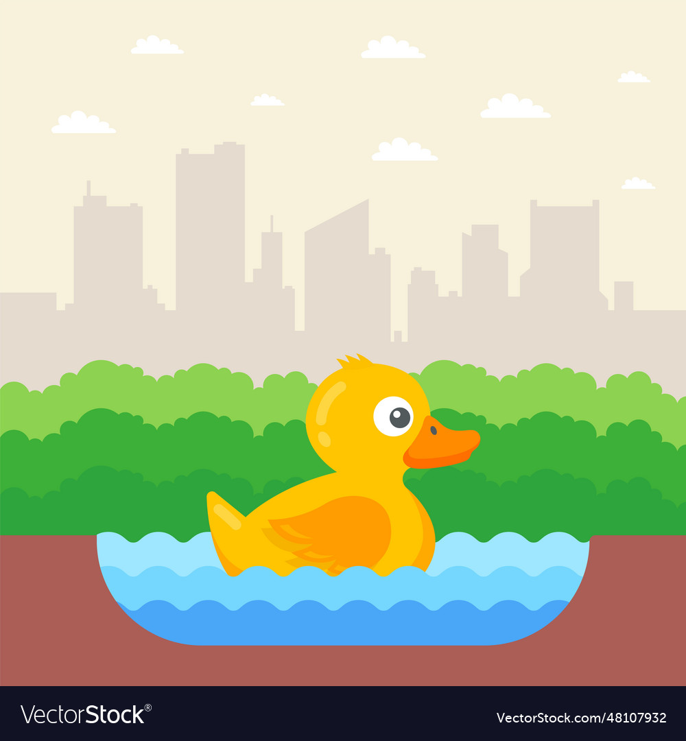 Yellow little duckling swims in the lake