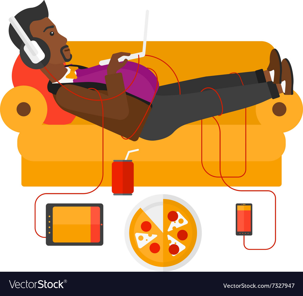 Man with gadgets lying on sofa