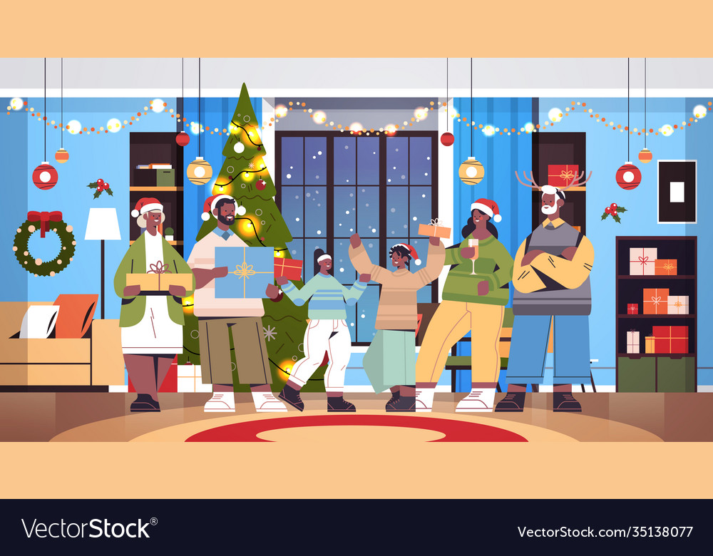 Multi generation family in santa hats holding Vector Image