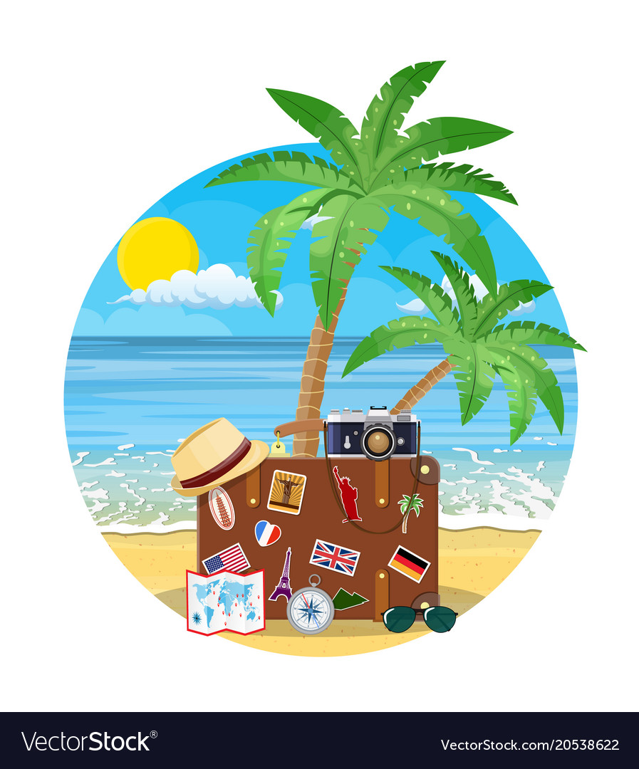 Vintage old travel suitcase on beach