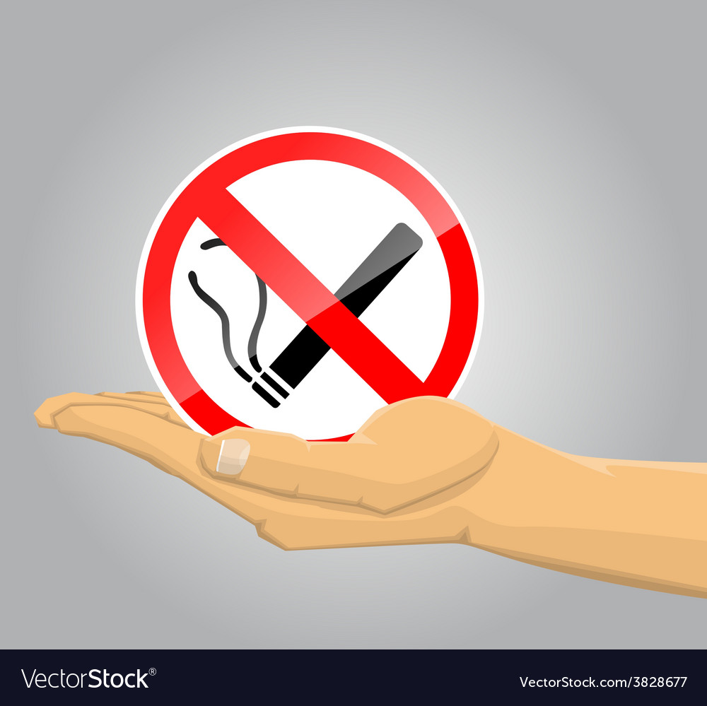 Hand holding no smoking sign