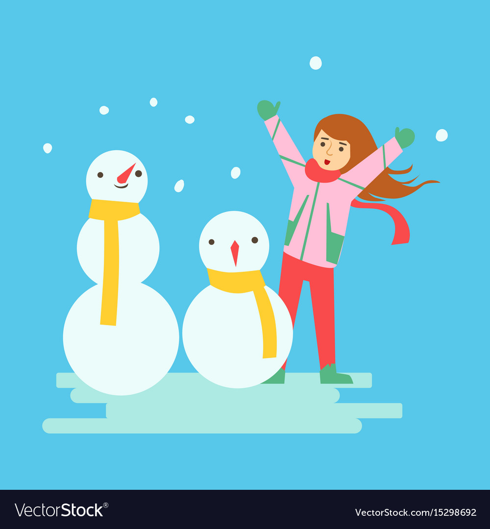 Happy girl making snowmen winter activity