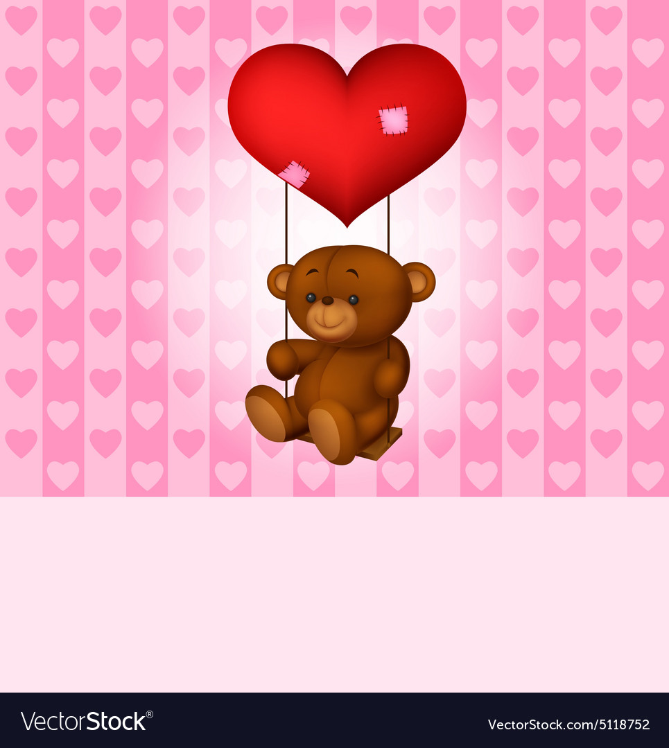 Toy teddy bear swinging on the balloon-heart