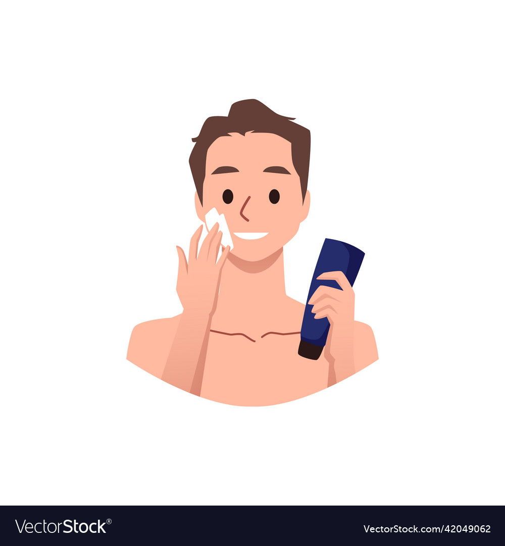 Smiling man applying facial moisturizing cream