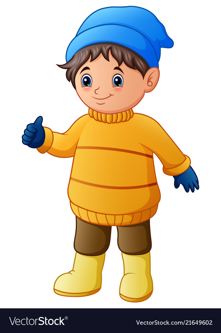 Happy boy in yellow winter clothes giving thumbs u