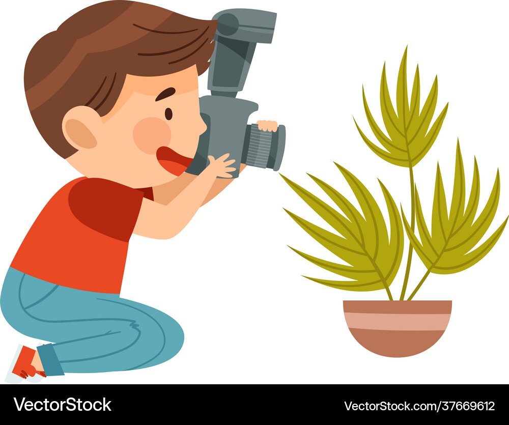 Pretty boy holding digital camera taking Vector Image