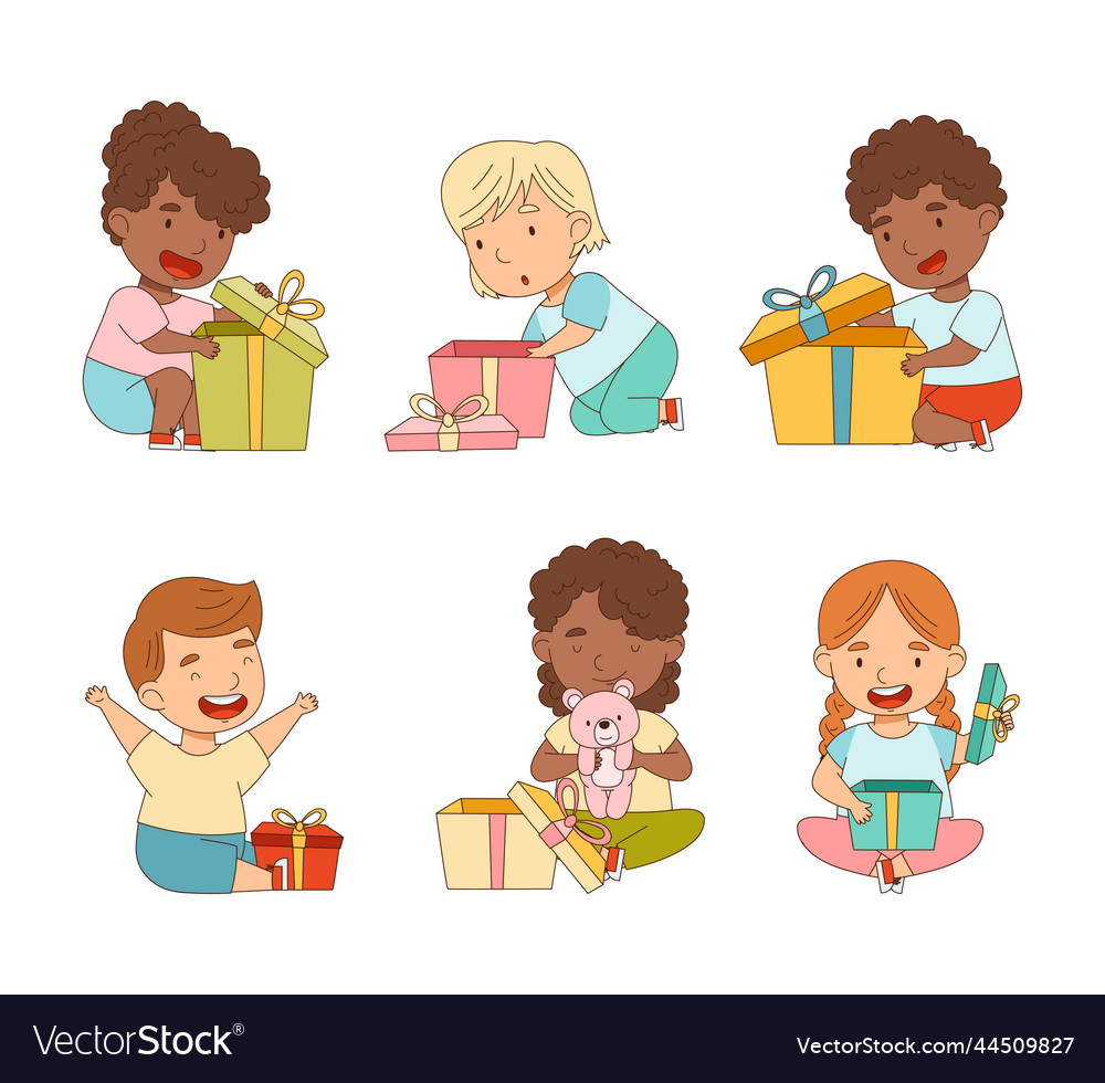 Happy kids with gift boxes set cute boys