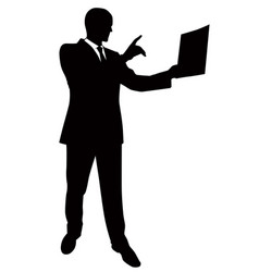 Silhouette of a business man in a suit standing Vector Image