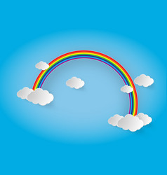 Vibrant rainbow in sky with white clouds Vector Image