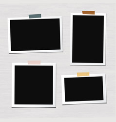 Retro photo frames hanging on rope isolated on Vector Image
