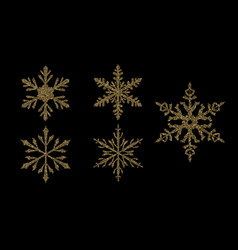Gold snowflakes set isolated on black Royalty Free Vector