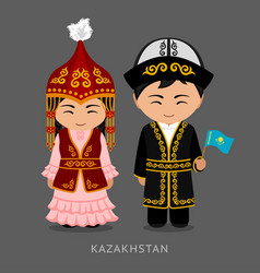 Malaysians in national dress with a flag Vector Image