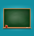 green chalkboard with chalk and red apple vector image