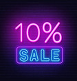 10 percent sale neon sign on brick wall background vector image
