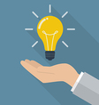 hand holding lightbulb idea vector image