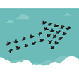 flock of birds flying in the sky in an arrow vector image vector image
